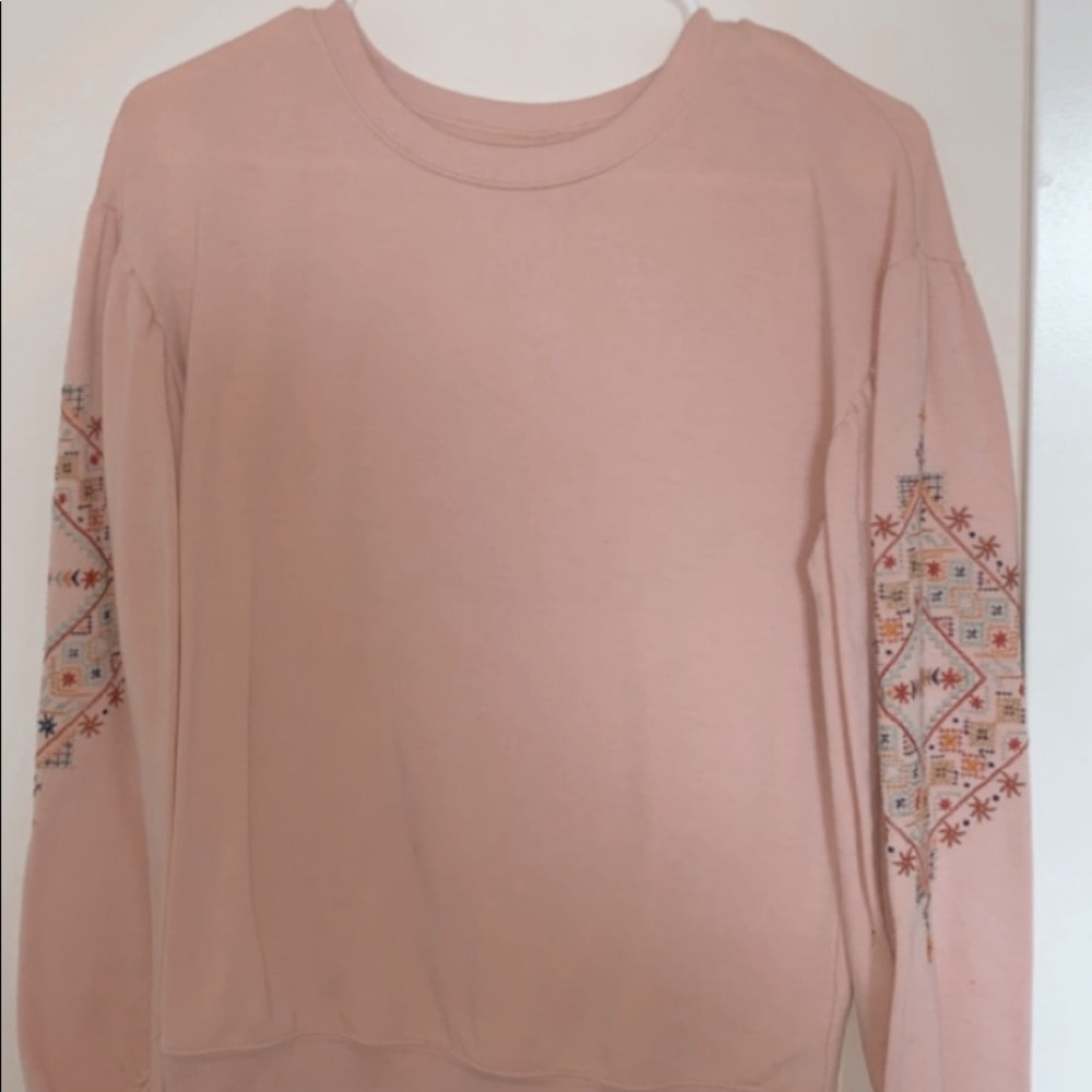 pink embroidered sweater